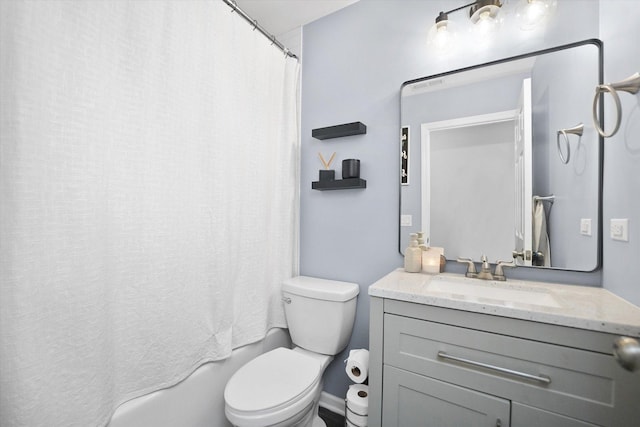 full bathroom with vanity, toilet, and shower / tub combo with curtain