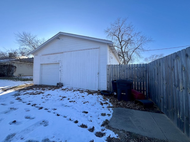298 N Adams St, El Paso, IL 61738 - view of snow covered garage