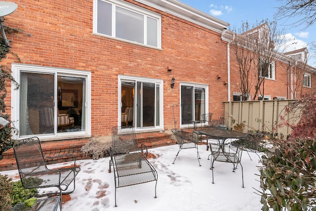 view of snow covered property