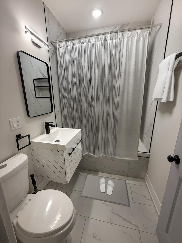 full bathroom featuring shower / bath combination with curtain, vanity, and toilet