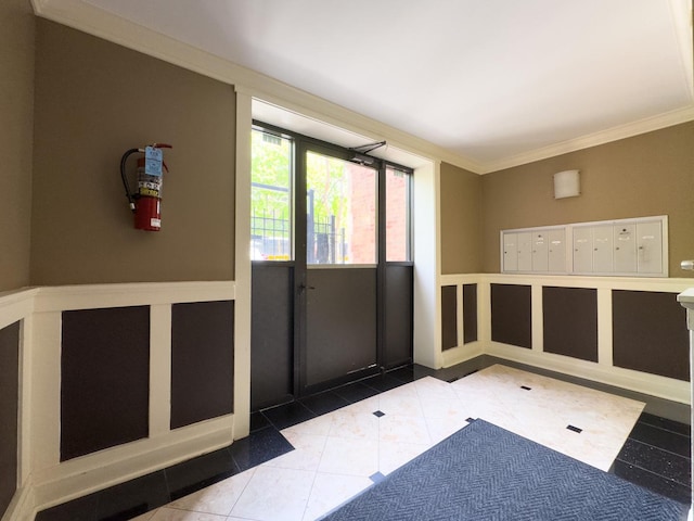 6750 N Greenview Ave Unit G, Chicago, IL 60626 - doorway with crown molding, tile patterned floors, and mail area