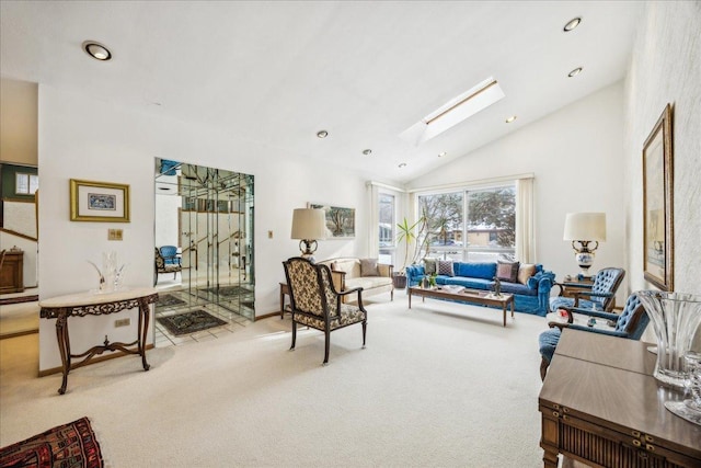 carpeted living room with vaulted ceiling with skylight