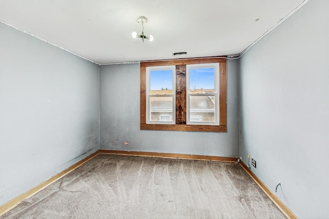 empty room with carpet flooring