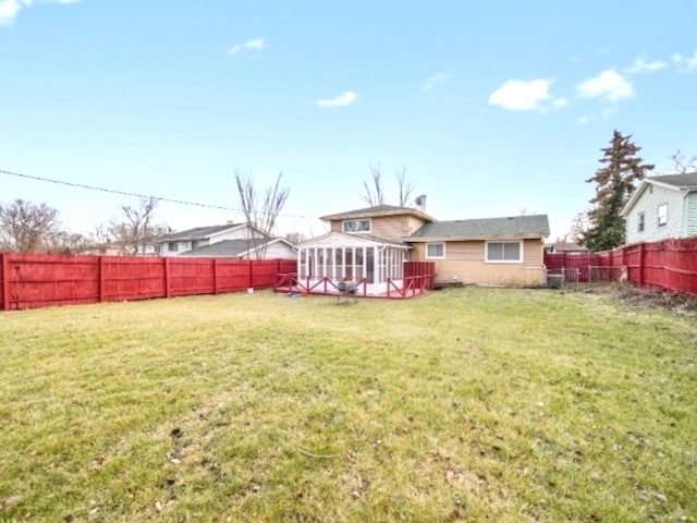 view of yard featuring a sunroom