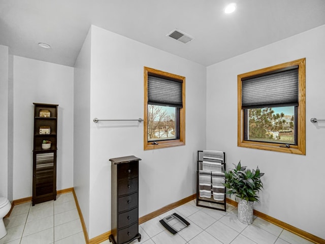 living area with light tile patterned flooring