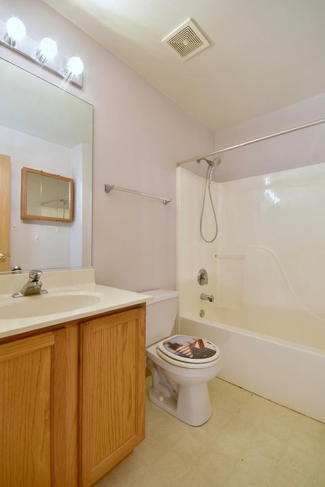 full bathroom with vanity, toilet, and shower / bath combination