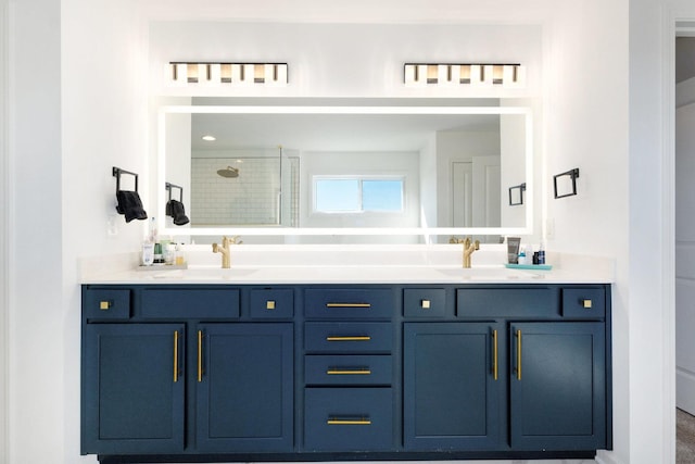 bathroom with vanity and a shower