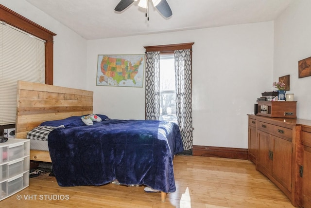 bedroom featuring ceiling fan and light wood-type flooring