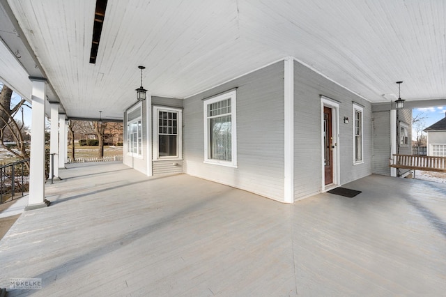 view of patio featuring a porch