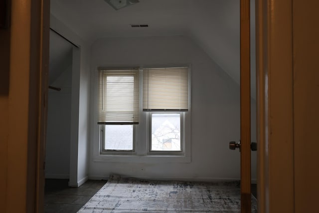 interior space featuring lofted ceiling