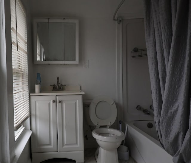 full bathroom featuring vanity,  shower combination, and toilet