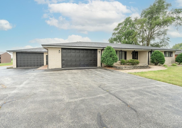 single story home with a garage