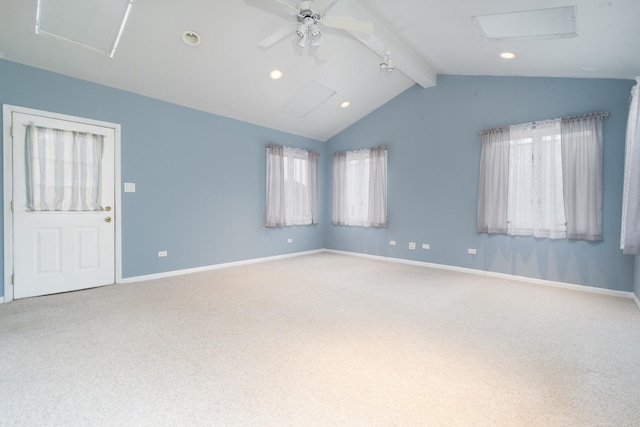 carpeted spare room featuring lofted ceiling with beams and ceiling fan