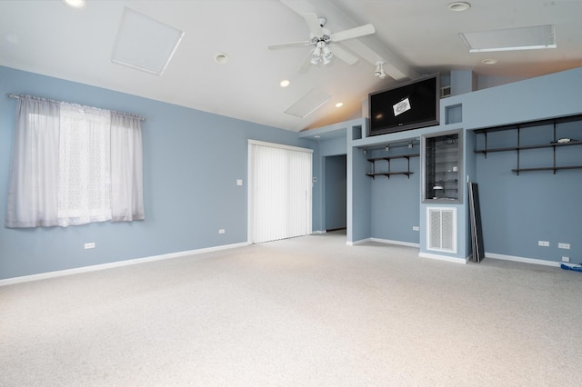 unfurnished living room featuring carpet flooring, lofted ceiling with beams, and ceiling fan