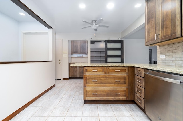 kitchen with dishwasher, decorative backsplash, kitchen peninsula, and ceiling fan