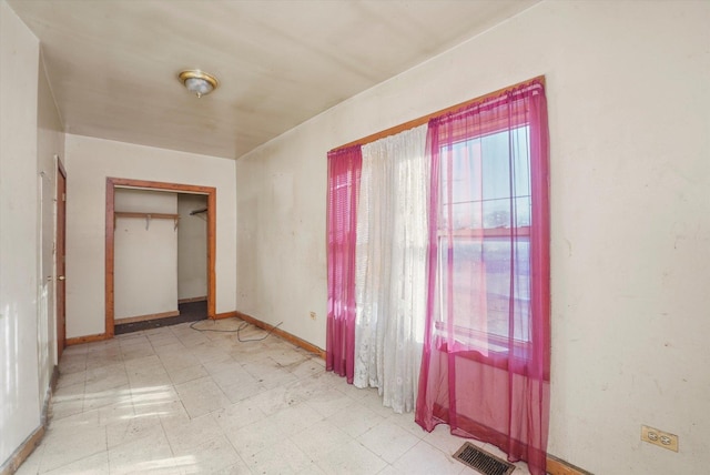 unfurnished bedroom featuring a closet