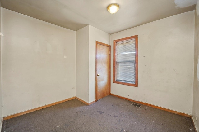 view of carpeted spare room