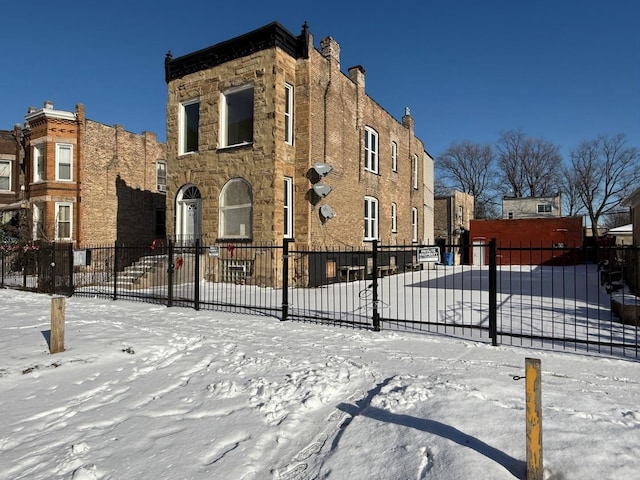 view of snow covered property