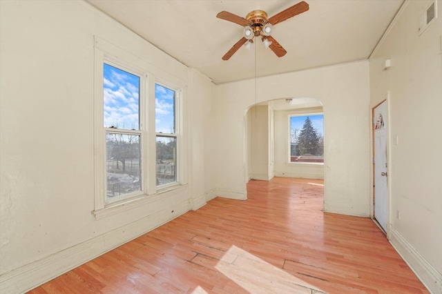 unfurnished room with ceiling fan and light hardwood / wood-style floors