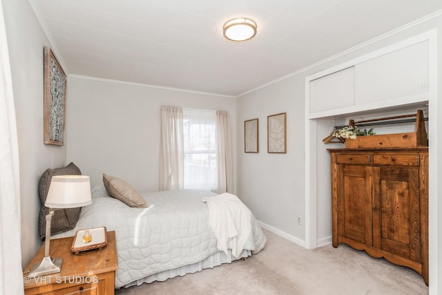 bedroom featuring crown molding and light colored carpet