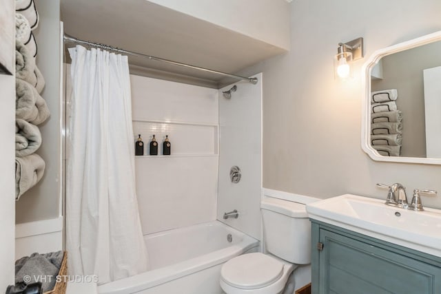 full bathroom with shower / bathtub combination with curtain, vanity, and toilet