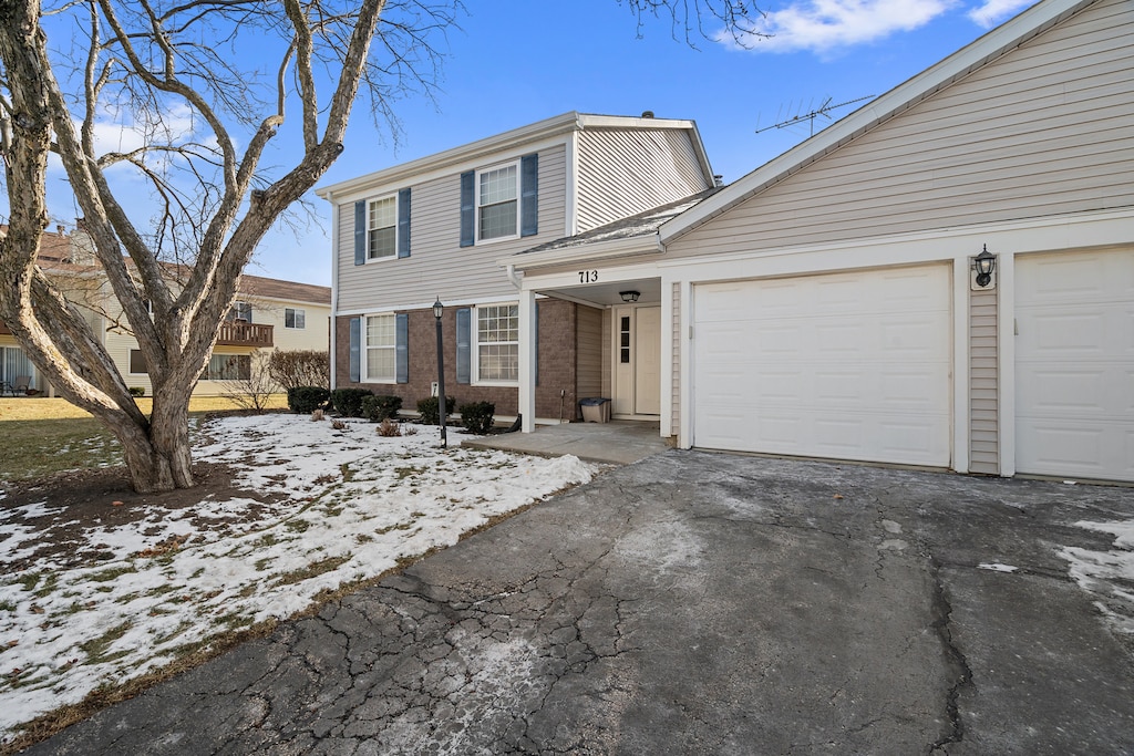 front of property featuring a garage