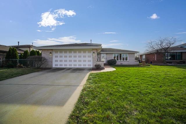 ranch-style home with a front yard and a garage