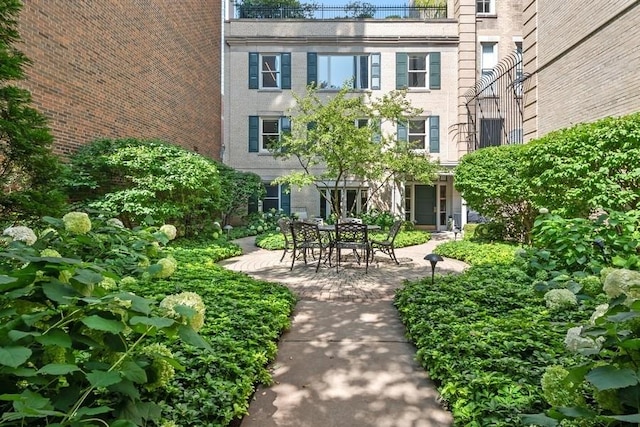 view of community with a patio