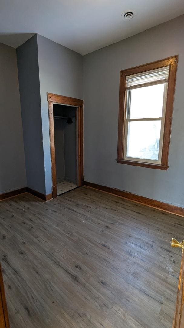 spare room featuring light hardwood / wood-style floors