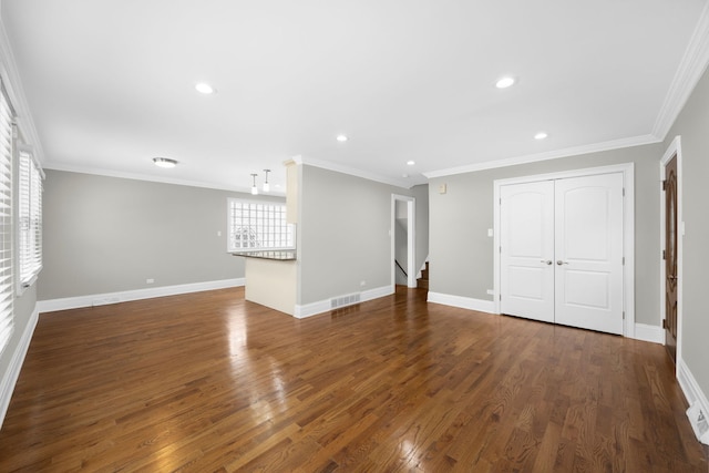 unfurnished living room with dark hardwood / wood-style floors and crown molding