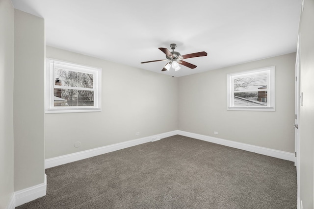 carpeted empty room with ceiling fan