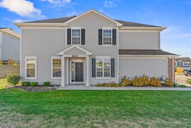 view of front of house featuring a front lawn