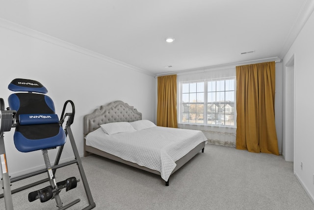 bedroom featuring carpet flooring and crown molding