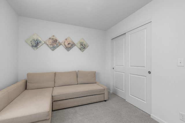 living room with light colored carpet