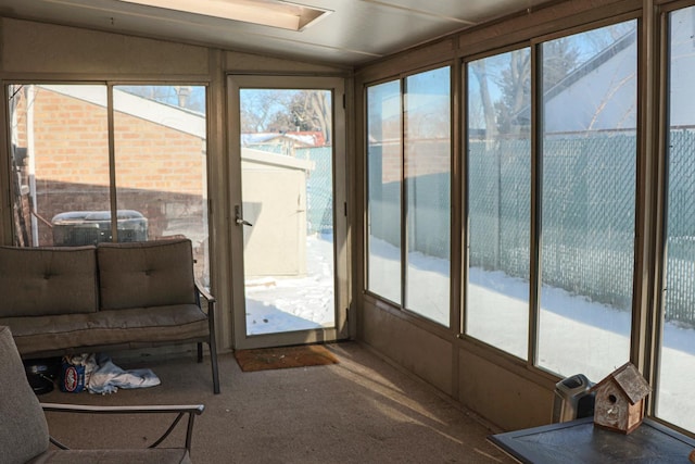 sunroom / solarium with lofted ceiling