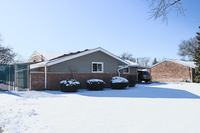 view of snow covered property