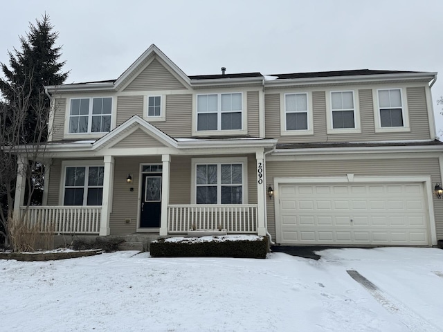 view of front facade featuring a garage and a porch