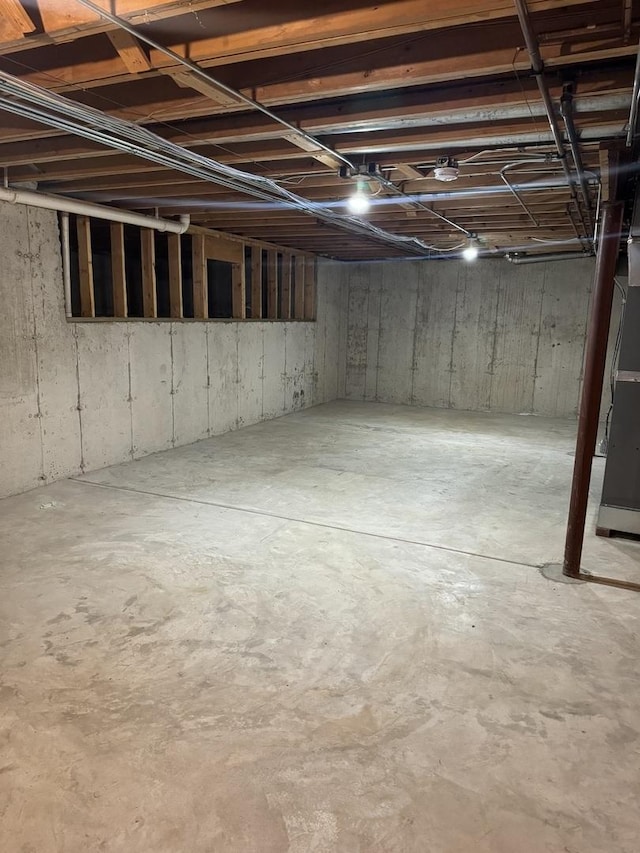 basement with heating unit