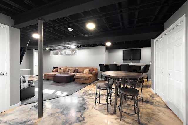 dining space with concrete floors