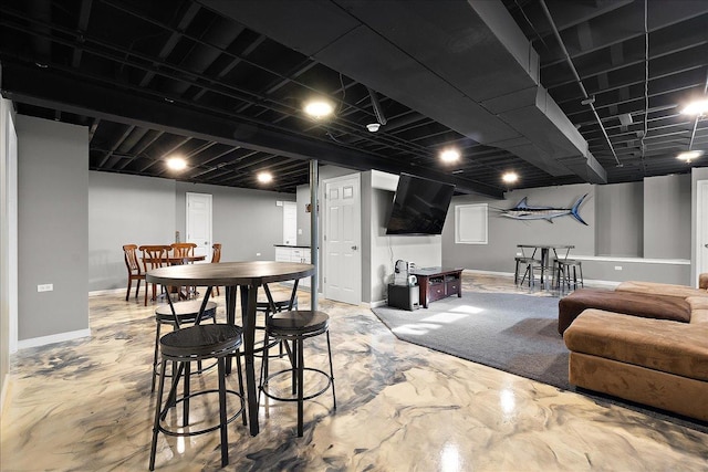 dining room with concrete floors