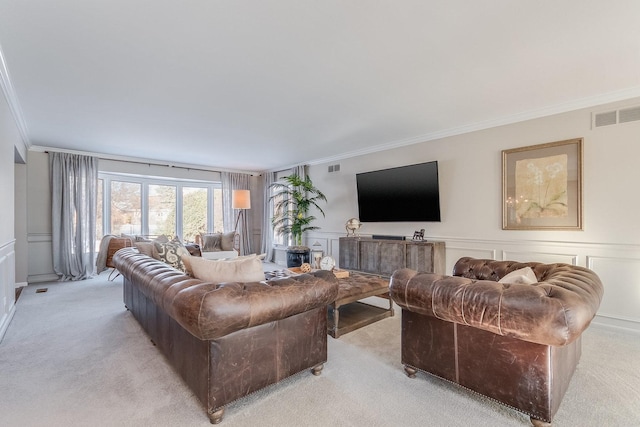 living room with light colored carpet and ornamental molding