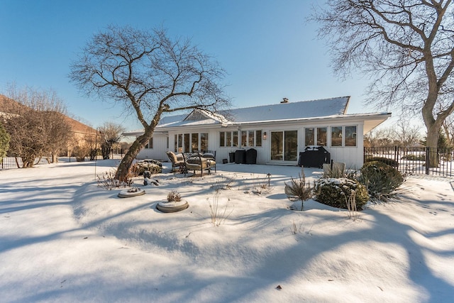 view of snow covered property