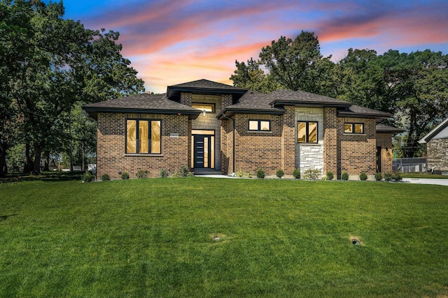 prairie-style house with a lawn