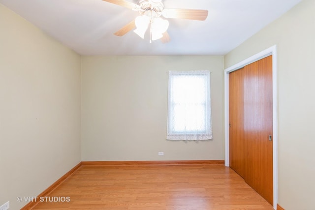 unfurnished room featuring ceiling fan and light hardwood / wood-style flooring