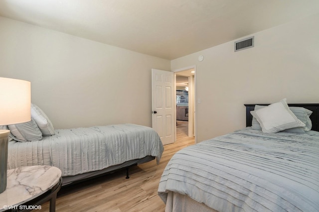 bedroom featuring light hardwood / wood-style flooring