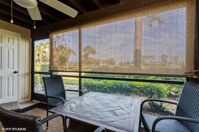 sunroom / solarium with ceiling fan