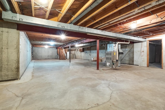 basement with heating unit and gas water heater