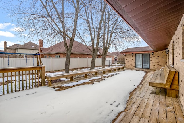 view of snow covered deck