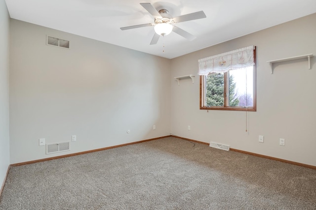 carpeted empty room with ceiling fan