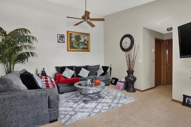 living room featuring ceiling fan and light colored carpet